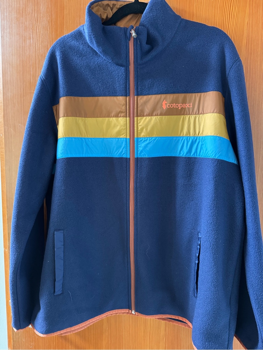 Cotopaxi Navy Fleece XL Jacket with Brown, Yellow & Bright Blue Stripe